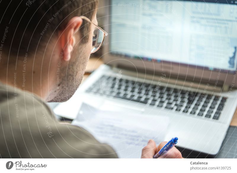 Young man working on laptop, online lecture labour at home home office Study Lecture Online Internet portrait Education Desk Window Workplace Computer