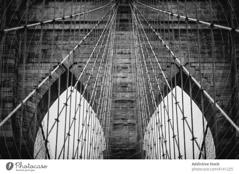 Detail of Brooklyn bridge in overcast weather brooklyn bridge tower suspension arch construction stone architecture landmark new york america usa united states