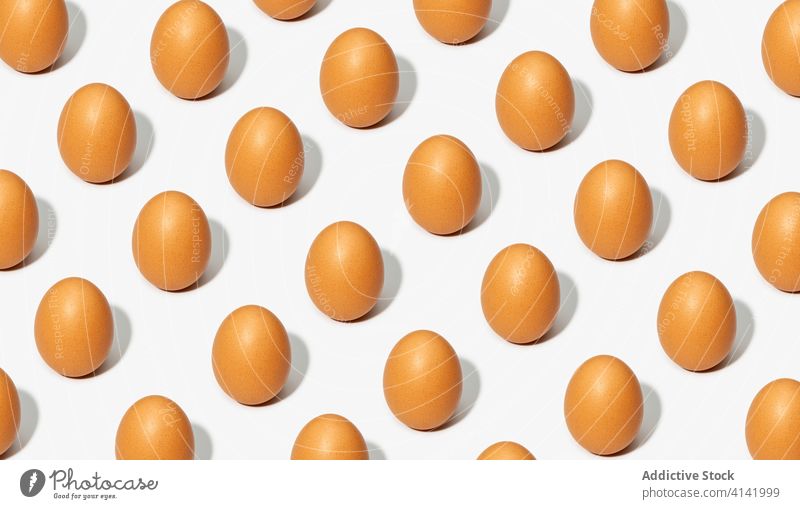 Brown eggs on white background seamless pattern natural table fresh raw shadow design tradition organic tasty studio food ingredient delicious easter nutrition