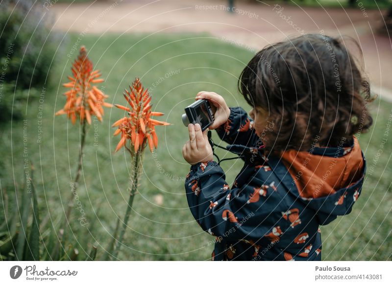 Cute girl taking photos Child 1 - 3 years Caucasian Photography Camera Digital Digital photography Technology travel Infancy Beautiful Portrait photograph Joy