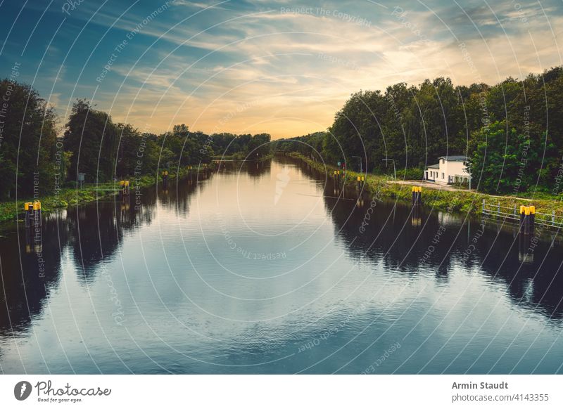 beautiful canal landscape with evening sky and smooth water berlin building calm cloudscape environment europe forest germany gracht idyllic mooring nature