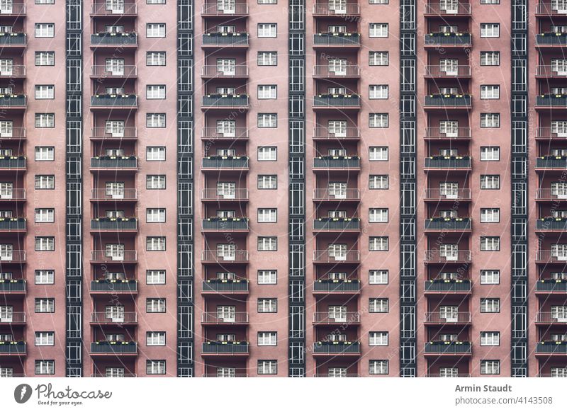 architectural pattern, dark facade with windows and balconies of a miserable berlin house anonymity anonymous architecture background balcony big block building