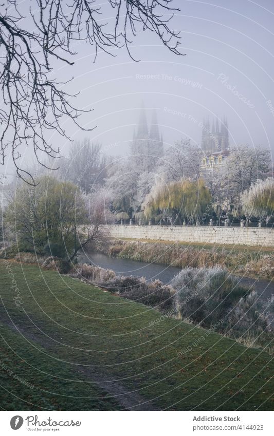 Amazing view of old city in winter frost garden castle season cold nature tranquil burgos spain peaceful landscape calm tree plant scenic river serene idyllic