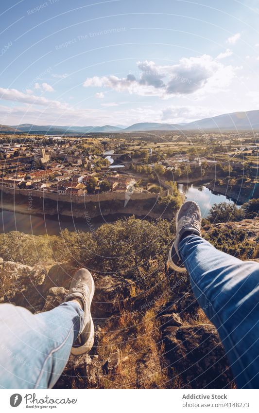 Crop traveling male during vacation traveler cityscape summer man old historic tourist town buitrago del lozoya madrid spain hill amazing journey sit