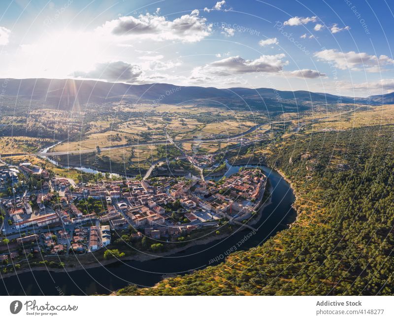 Amazing cityscape on sunny day amazing old river town scenery water spectacular buitrago del lozoya madrid spain building cloudy sky landscape nature travel