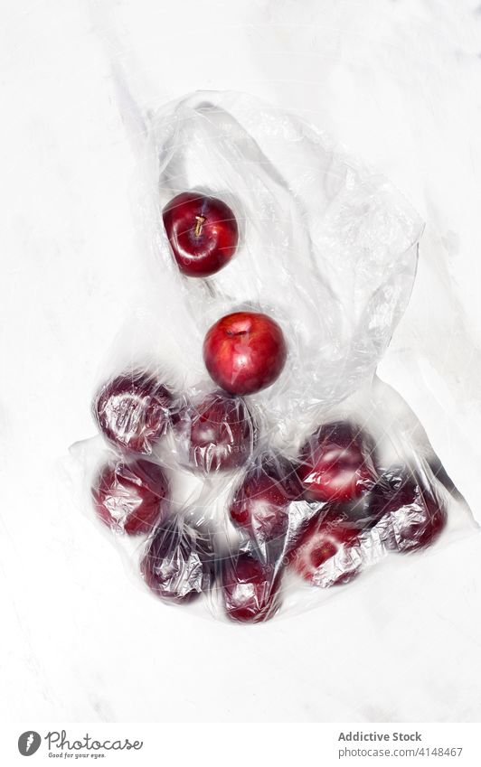 Fresh cherry in plastic sack berry ripe red fresh sweet natural delicious organic food vitamin fruit dessert tasty nutrition juice ingredient summer season