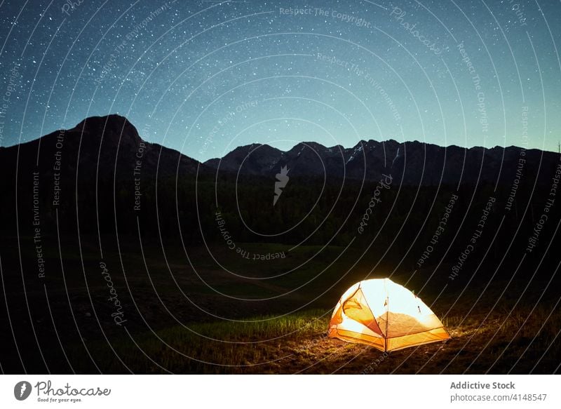 Camping tent in canyon at night camp mountain starry highland campsite travel illuminate usa united states america nature evening dark journey trip vacation