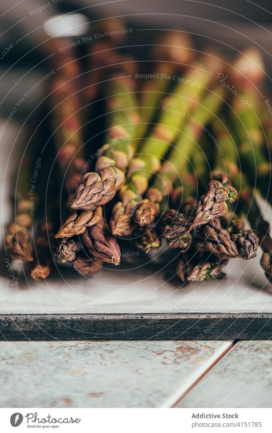 Fresh asparagus on the table raw freshness nutrition bunch cooking organic green ingredient food healthy background seasonal vegetable vegetarian diet vegan