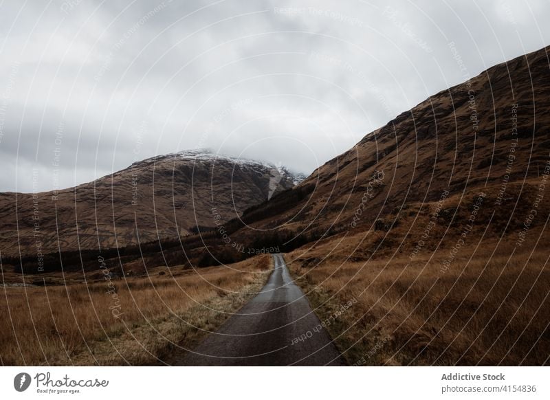 Snowy mountain peak in autumn landscape scenery snow gloomy scottish highlands scotland uk united kingdom rocky fall amazing journey scenic vacation nature cold