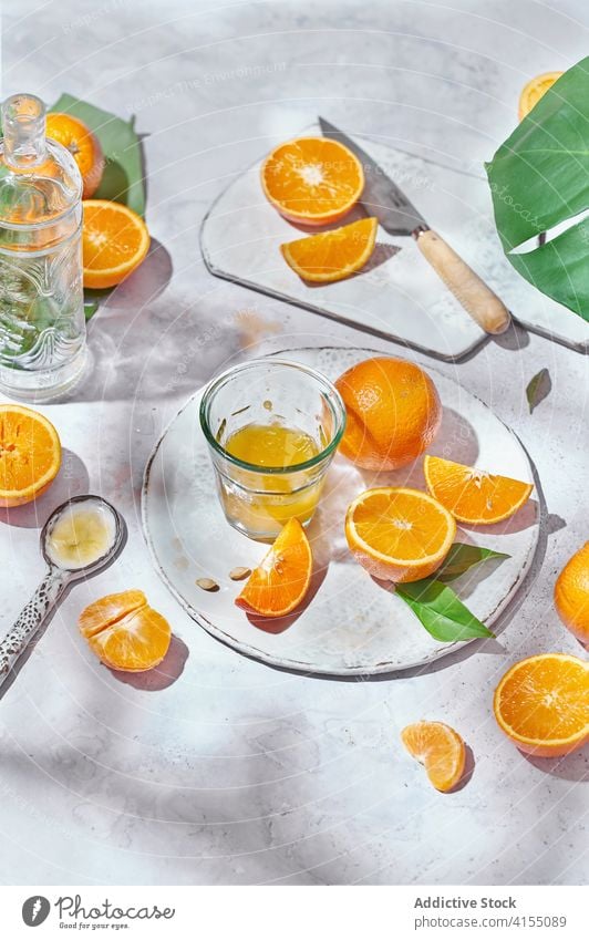 Delicious oranges for juice on table citrus arrangement prepare ripe knife glass fruit organic fresh vitamin ingredient nutrition bright vegetarian sweet