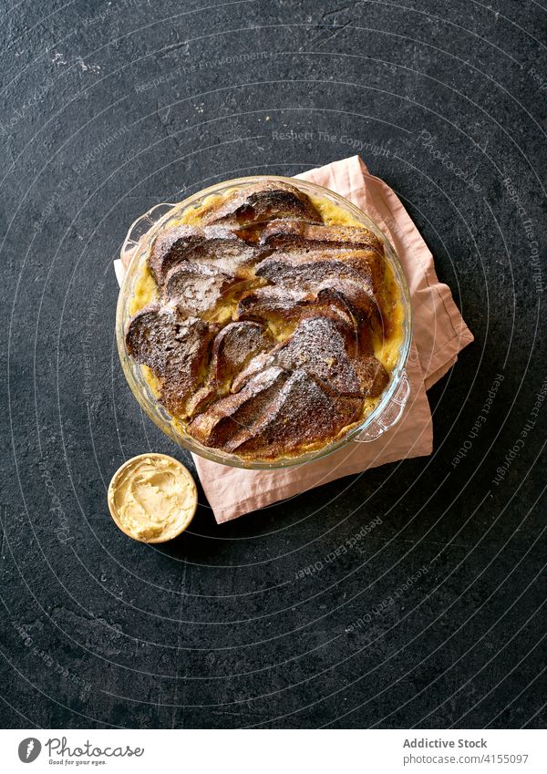 Sweet bread pudding with orange zest butter food custard delicious dessert meal sweet pastry vanilla homemade recipe background cuisine tasty sauce closeup