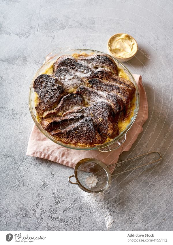 Sweet bread pudding with orange zest butter food custard delicious dessert meal sweet pastry vanilla homemade recipe background cuisine tasty sauce closeup