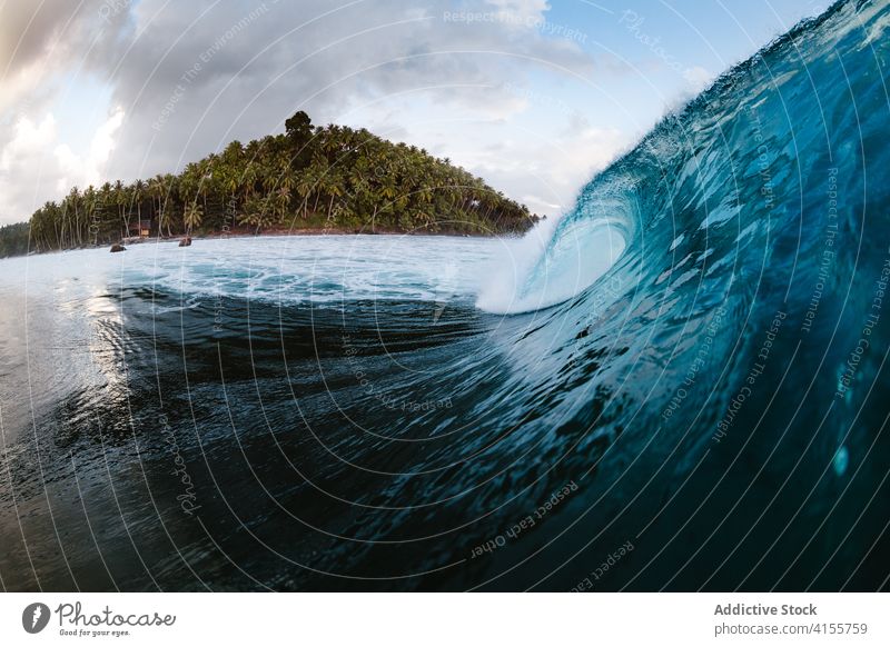 Stormy blue sea with waves ocean power water nature landscape seascape coast surf tropical crest summer splash white foam seashore surface storm wet spray