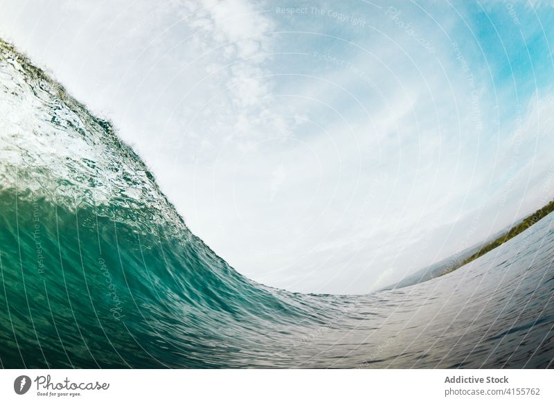 Stormy turquoise sea with waves ocean power water nature landscape blue seascape coast surf tropical crest summer splash white foam seashore surface storm wet