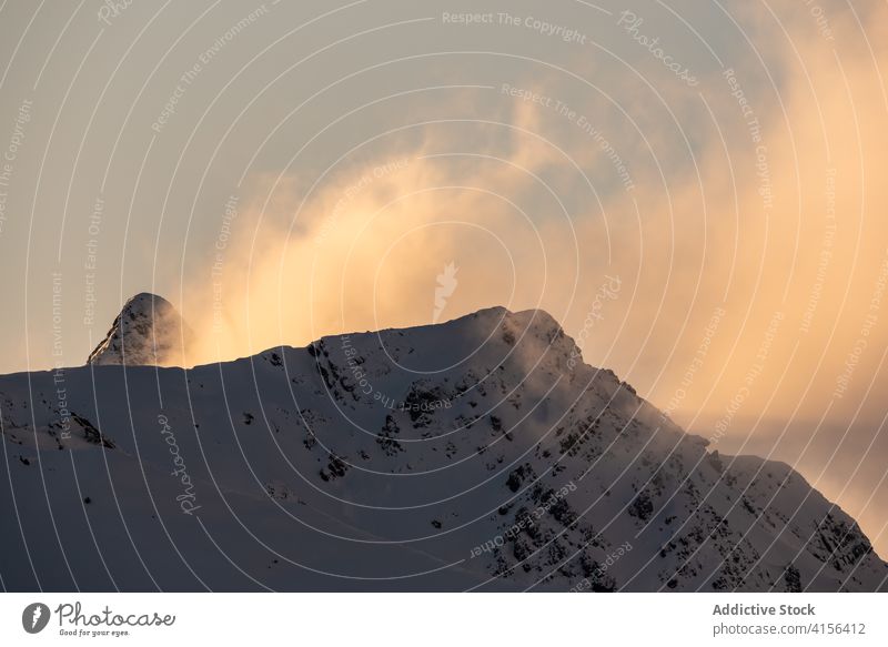 Snowy mountain ridge in winter range snow cloudy sky fog dramatic highland landscape amazing pyrenees huesca spain scenery spectacular cold nature environment