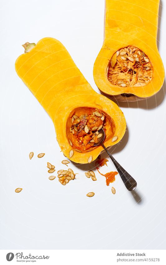 Cooking butternut squash pumpkin vegetable cookery seed food slice fresh orange healthy vegetarian season harvest closeup organic ingredient ripe raw autumn