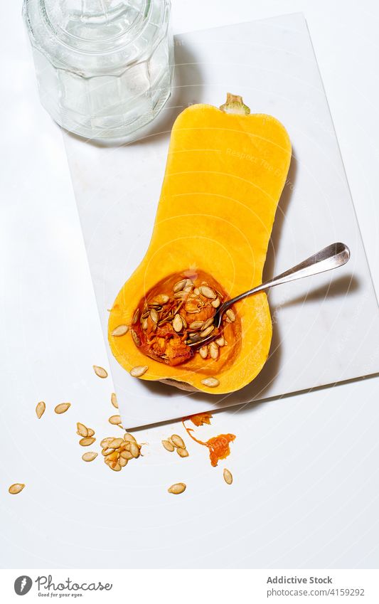 Cooking butternut squash pumpkin vegetable cookery seed food slice fresh orange healthy vegetarian season harvest closeup organic ingredient ripe raw autumn