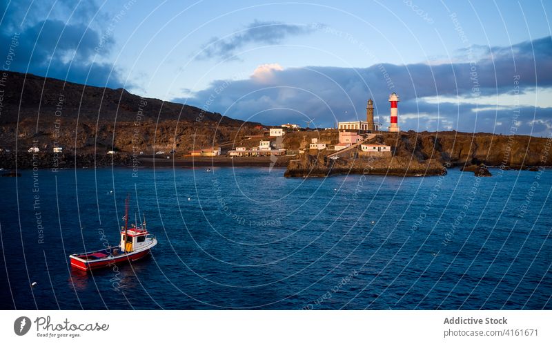 Fishing boat in sea near port fishing bay float amazing landscape scenic sunset water ocean vessel travel vacation transport nature scenery nautical calm