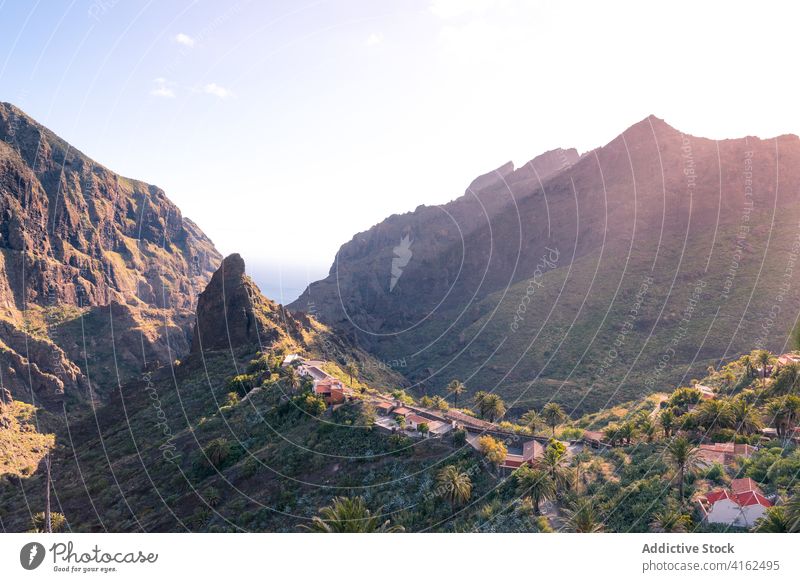 Picturesque village in mountainous terrain in morning cottage range landscape residential building dawn highland canary islands spain tenerife settlement house