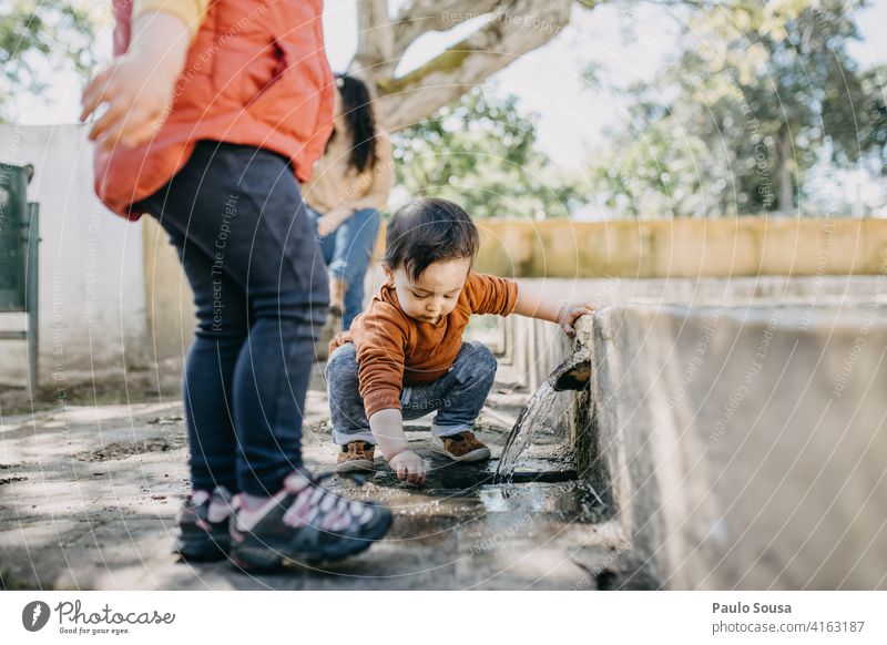 Brother and sister playing outdoors Brothers and sisters Family & Relations Child childhood 1 - 3 years Lifestyle Human being Infancy Toddler Colour photo