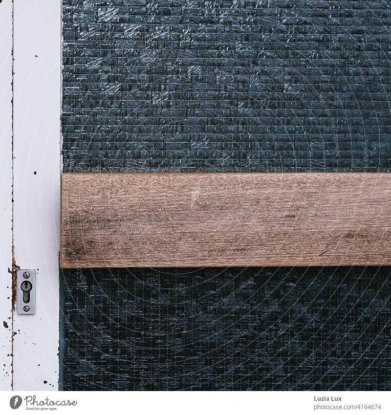 Strictly locked: Entrance door of a public building. Metal, wood and glass with wire mesh. Safety Historic Keyhole door handle Lock Structures and shapes Detail