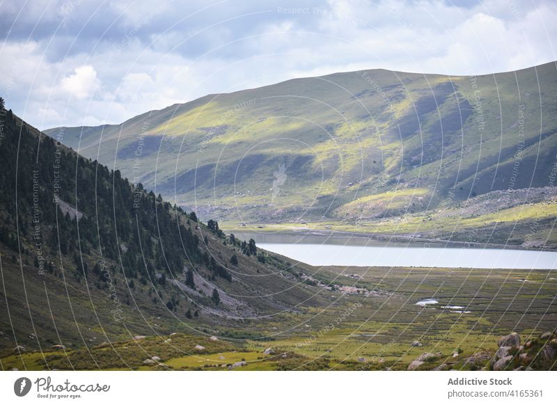 Cloudy sky in green mountains cloudy fog scenery majestic breathtaking picturesque nature hill lake peak tibetan area blue landscape travel tranquil peaceful