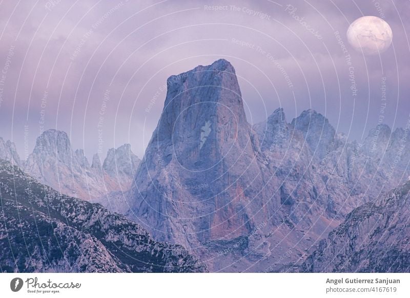 El Naranjo de Bulnes mountain peak in Picos de Europa, Asturias, Spain panorama scenery sunrise meadow geologic hiking light national rock rural scenic blue