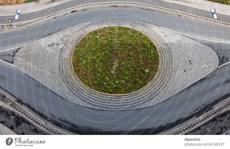 keep an eye on the traffic Gyroscope Traffic circle Eyes Deserted Traffic infrastructure Transport Street Exterior shot Colour photo Day Crossroads Town