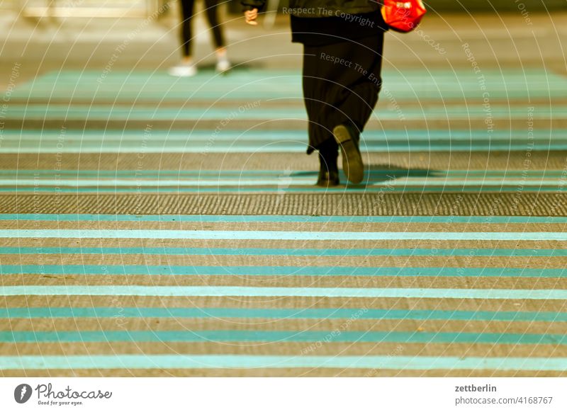 Strip on the street with passerby Asphalt Corner Lane markings Pedestrian Pedestrian crossing Clue Line Left navi Navigation Orientation Right Direction Street