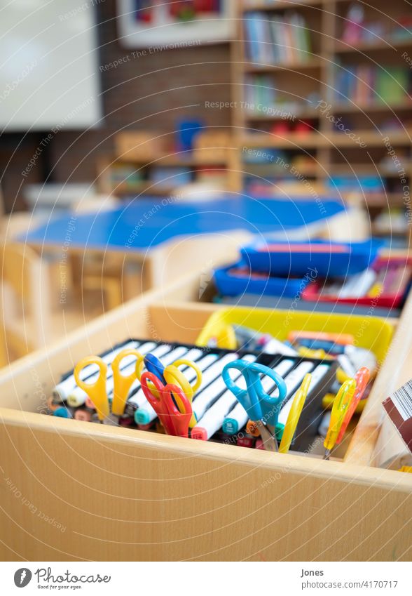 Pens and scissors at school School pens Claw variegated Kindergarten Wood blurred colourful Interior shot children fun Handicraft