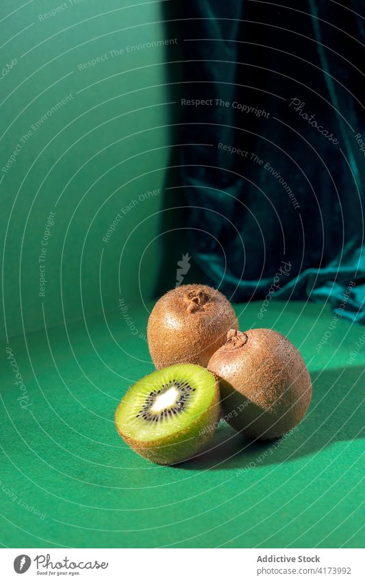 Various green kiwis on table fruit various fresh natural food healthy organic vitamin ripe color nutrition diet vegetarian tasty colorful ingredient raw