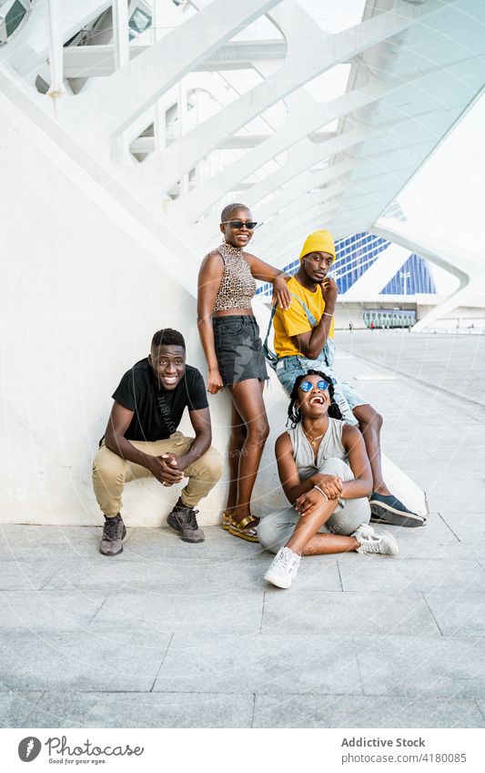 Company of black friends gathering on street portrait city urban cool people friendship unity friendly ethnic african american together weekend group style