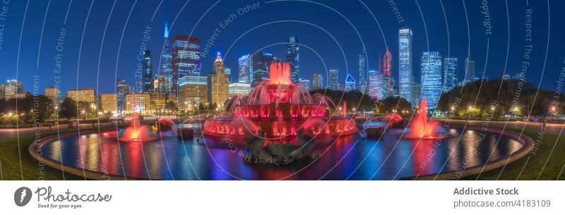 Illuminated fountain in night city illuminate cityscape famous landmark attract architecture urban glow chicago usa america united states skyscraper light