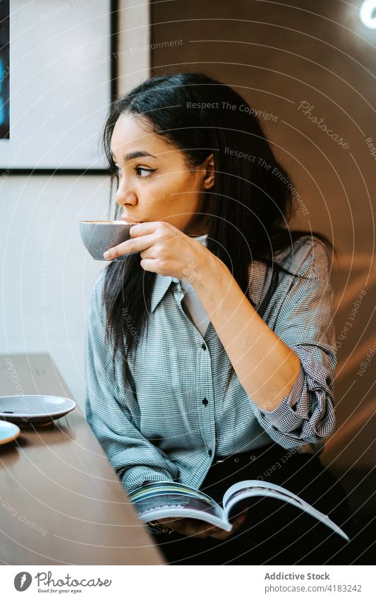 Woman drinking a cup of coffee woman coffee shop female cafe people person young restaurant lifestyle holding girl caucasian bar indoors social breakfast