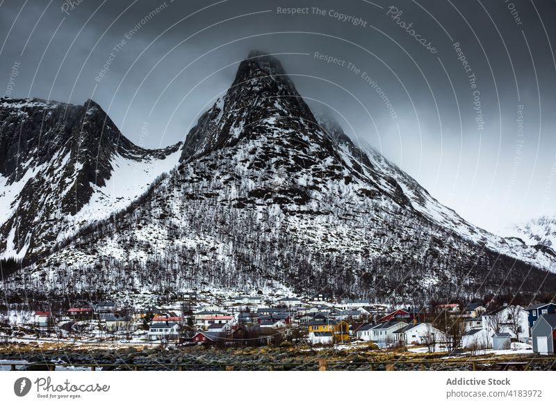 Fishing village in mountains in winter fishing sea highland house pier snow harbor norway settlement landscape nature coast shore weather scenic range scenery