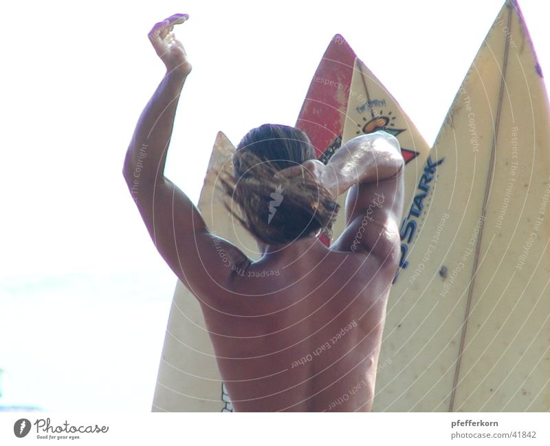 surf Legian Beach Bali Human being deckchair manager "John". -