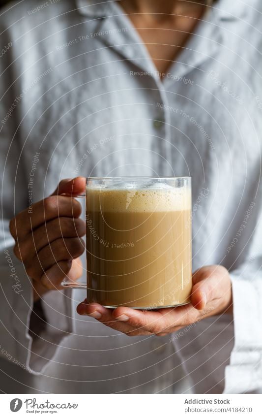 Crop woman with cup of fresh coffee breakfast foam morning tasty homemade drink beverage female glass delicious yummy energy caffeine mug refreshment hot lady