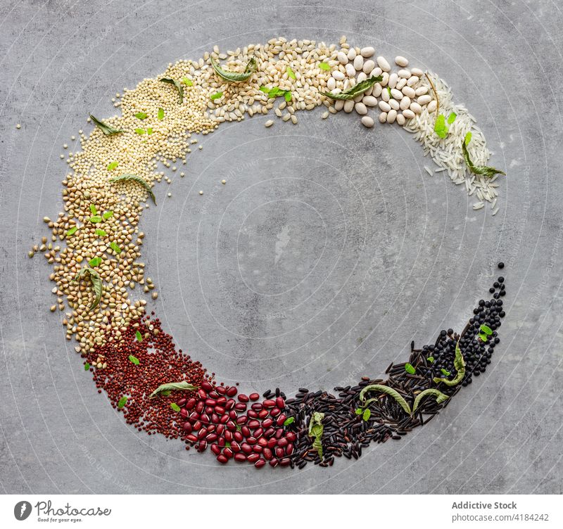 Crescent C letter made with assorted cereals grain composition crescent art concept bean arrangement legume agriculture gradient colorful organic healthy