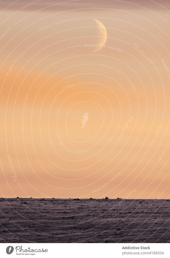 New moon above vast rough heath in early evening nature picturesque twilight barren mist tranquil iceland white night majestic environment spacious pink