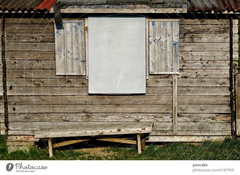 recommendation | the day ticket Hut Window Closed Wood Wooden house Empty Copy Space Bench Seating sign Wooden bench Loneliness Relaxation Hiking alpine hut