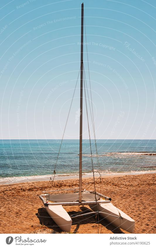 Catamaran on the beach on a sunny day ocean blue catamaran destination holiday sand sailboat coast cabo de gata andalusia spain summertime tropical sport