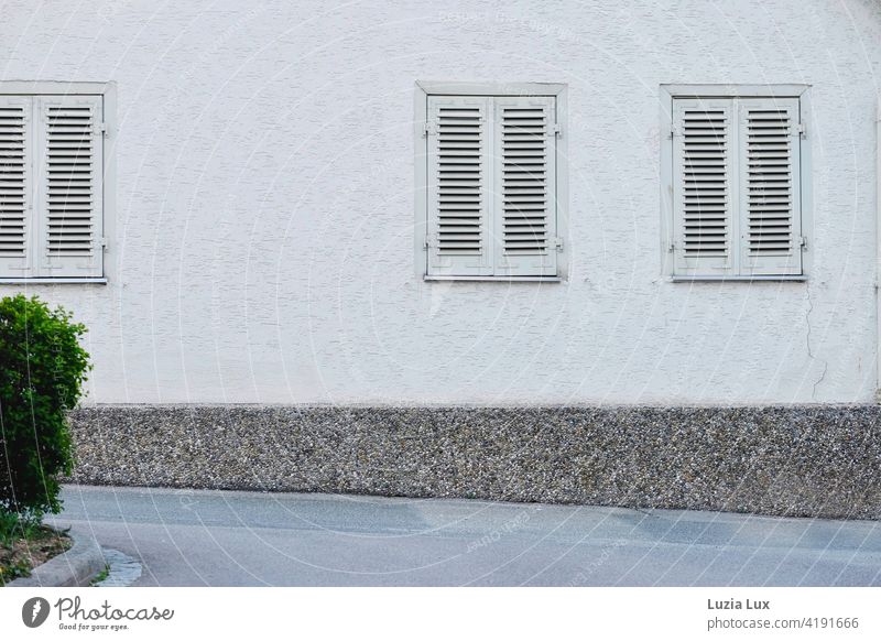 Facade on a sloping, narrow street. The house is old, the shutters closed. Colour photo Building Gloomy Architecture Manmade structures Copy Space bottom