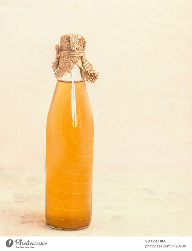 Bottle of homemade apple juice or vinegar on  kitchen table. Still life bottle still life ingredient raw vitamin beverage glass natural drink background fruit