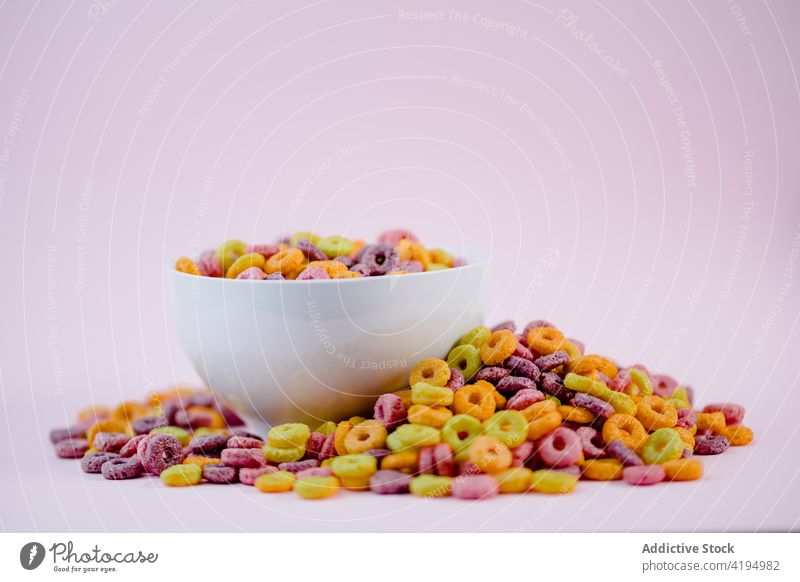 Corn rings in bowl on table cereal breakfast corn healthy food pile scatter nutrition fresh heap morning dish organic tradition vitamin plate crunch gourmet