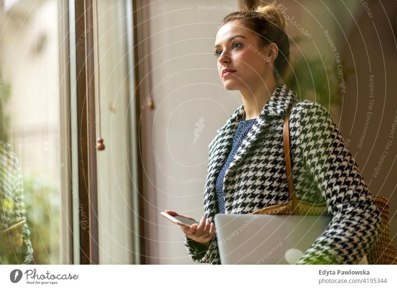 Portrait of confident businesswoman in office girl people Entrepreneur successful professional young adult female lifestyle indoors millennial attractive