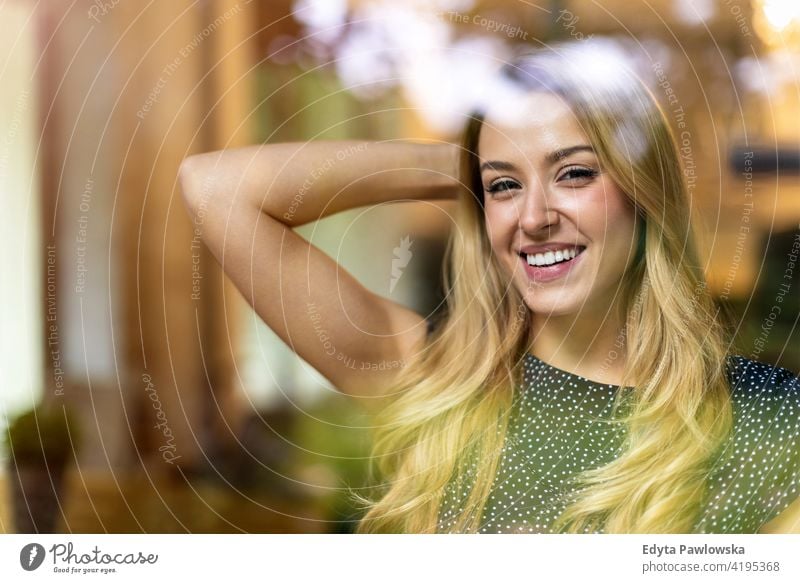 Smiling woman in the office looking at camera girl people Entrepreneur business businesswoman successful professional young adult female lifestyle indoors