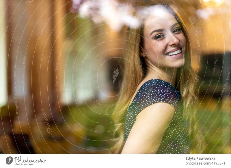 Smiling woman in the office looking at camera girl people Entrepreneur business businesswoman successful professional young adult female lifestyle indoors