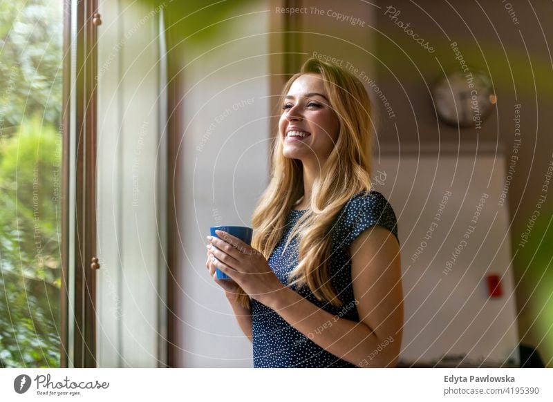 Smiling  business woman having coffee break in office kitchen girl people Entrepreneur businesswoman successful professional young adult female lifestyle