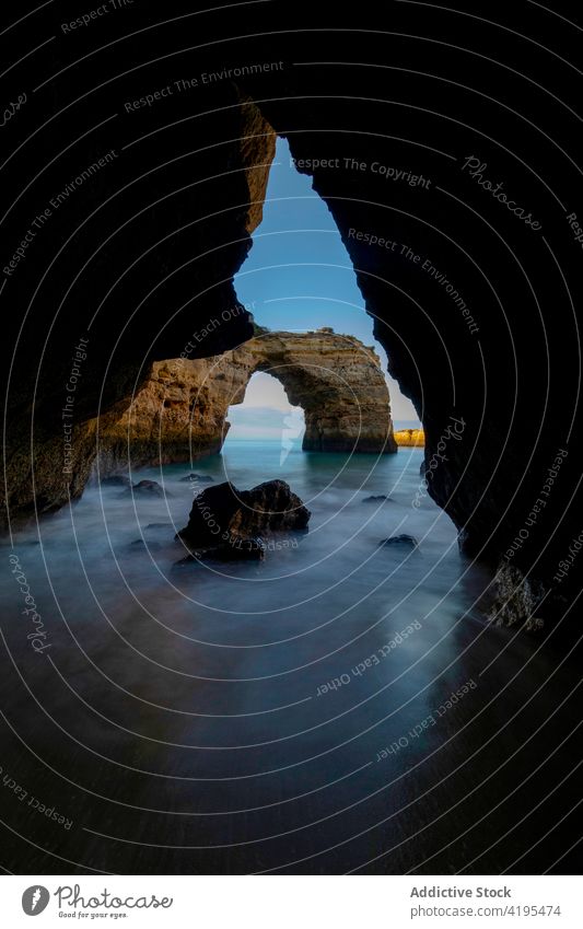 Massive arch rock in the seaside nature landscape highland ocean massive majestic picturesque formation portugal region algarve town scenic idyllic spectacular