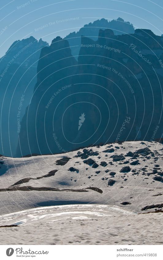 abysmal Environment Nature Landscape Sky Cloudless sky Sunlight Climate Beautiful weather Ice Frost Snow Rock Alps Mountain Peak Snowcapped peak Canyon